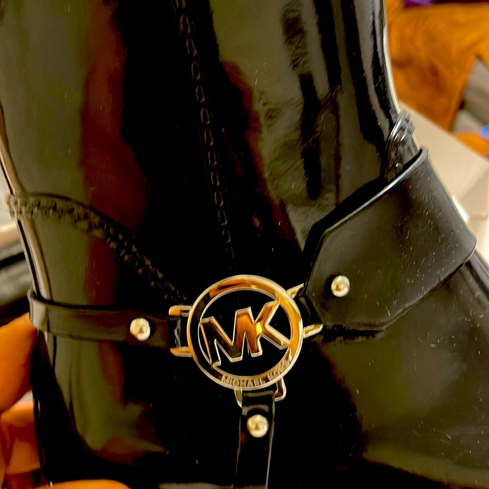 Michael, kor boots size 11 never been worn